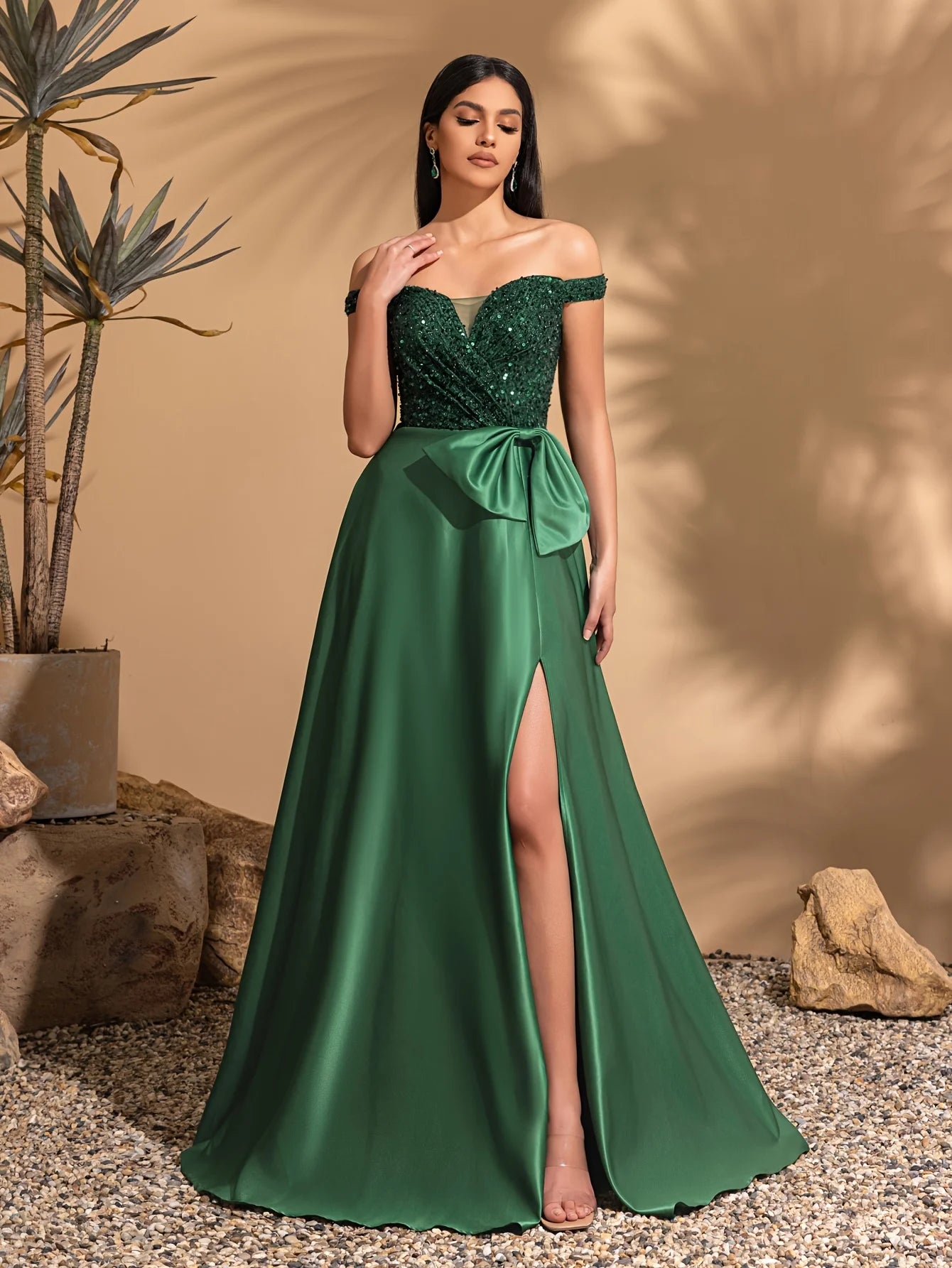 One-shoulder dress with bow decoration at waist and sequined satin hem